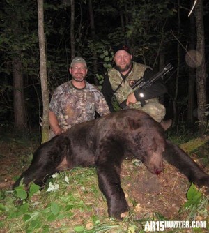 The Author and Guide with His Large MN Bear.