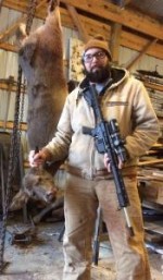 Will Chambers, with a deer he killed with his AR-15 rifle.